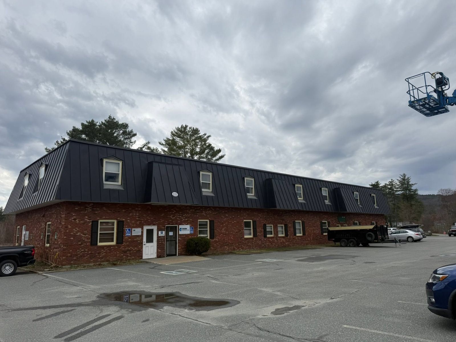 Mansard metal roof from the lot