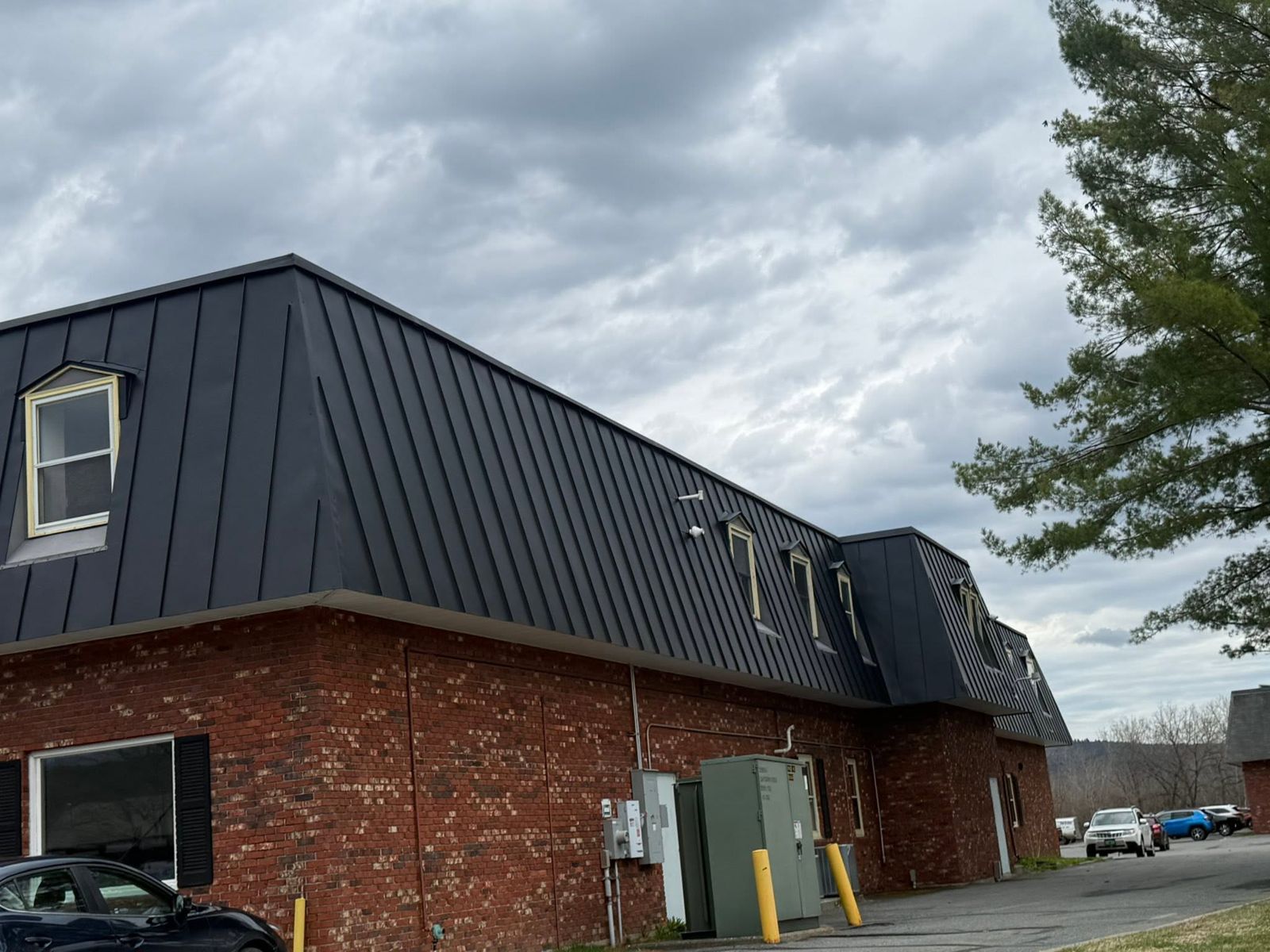 Mansard metal roof, side view